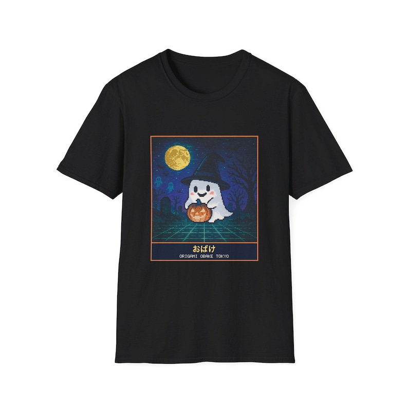 Black unisex T-shirt with a pixel-art ghost in a witch hat holding a jack-o'-lantern under a yellow moon