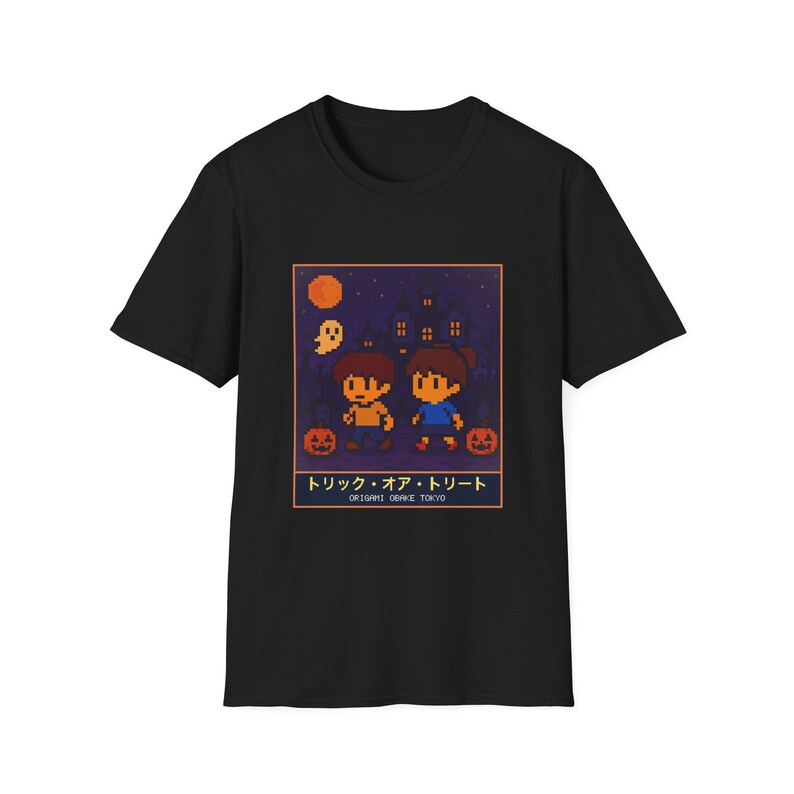 Black unisex T-shirt with a pixel-art trick-or-treat scene: two kids, a haunted house and pumpkins